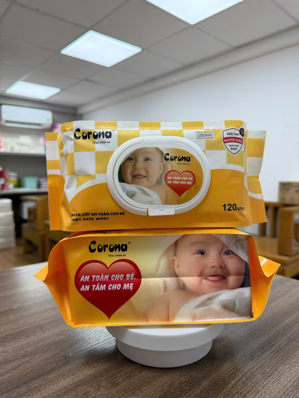 Two packs of Corona wet wipes for babies.