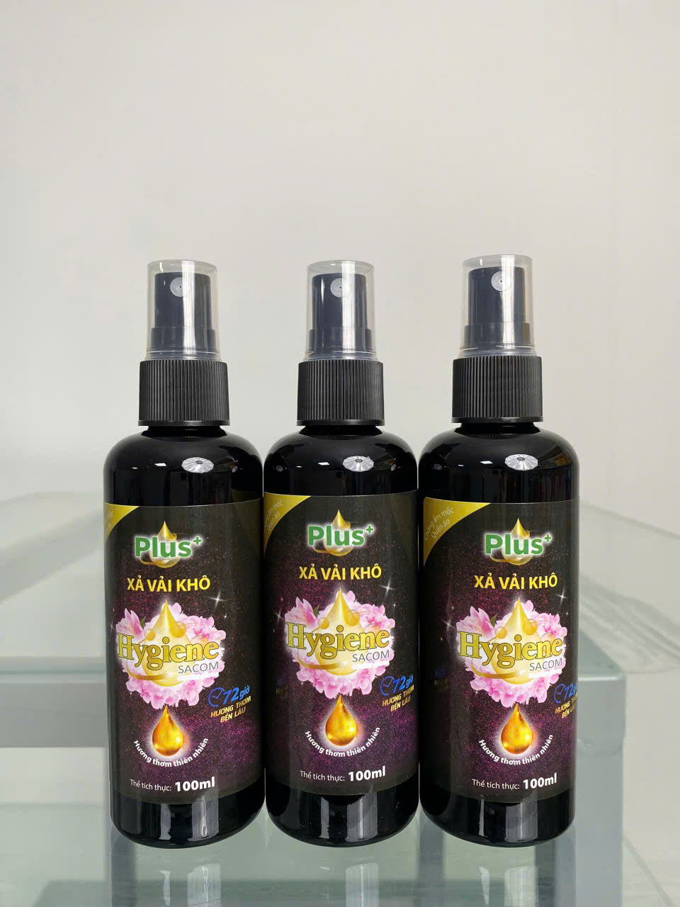 Set of three Plus+ Hygiene Sacom dry fabric softener spray bottles 100ml.
